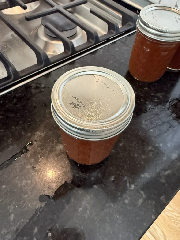 A filled jar by the stove