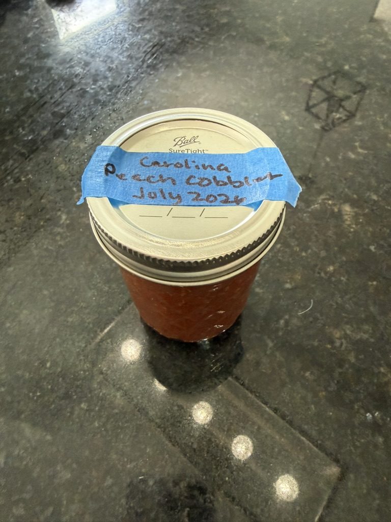 A jar labeled Carolina Peach Cobbler