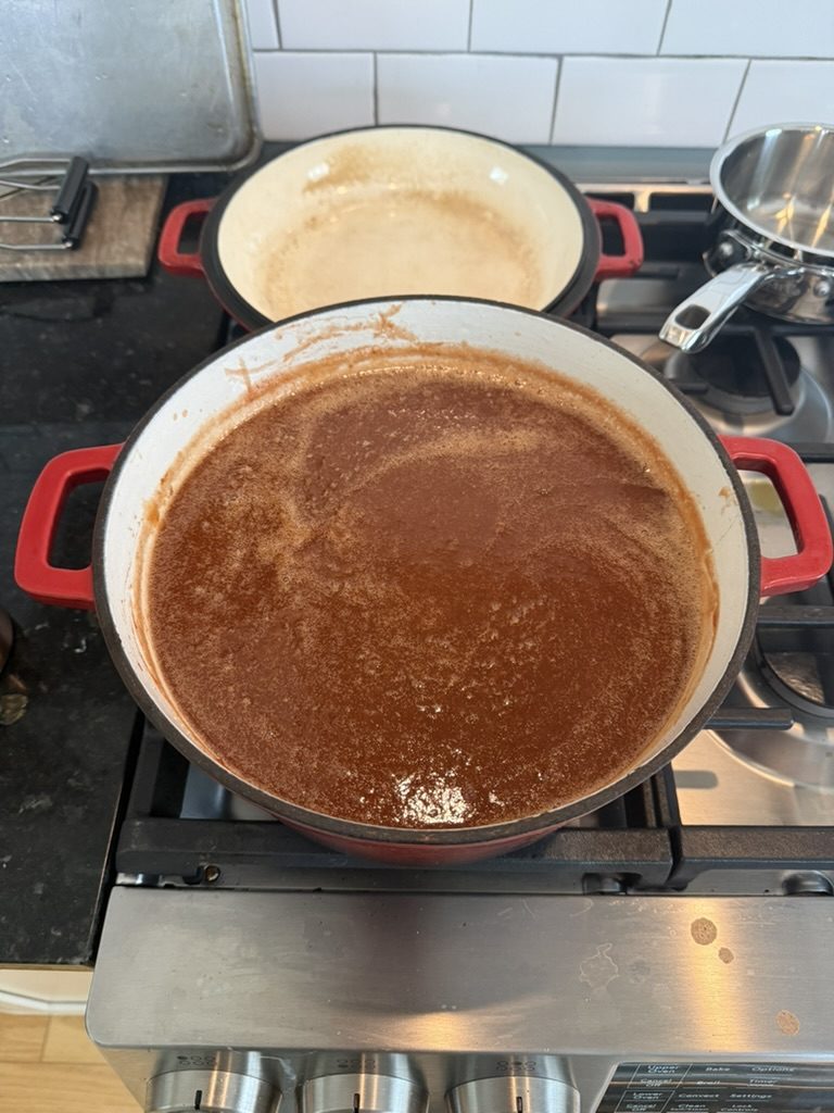 The peach puree in the pot