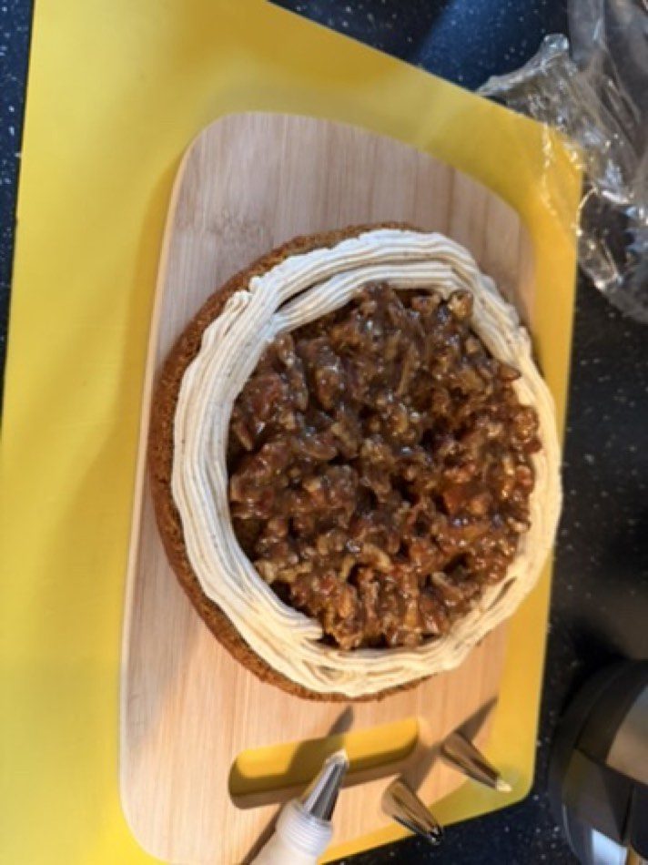 First layer with a frosting dam and pecan goo inside