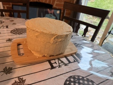 The finished cake on a fall tablecloth