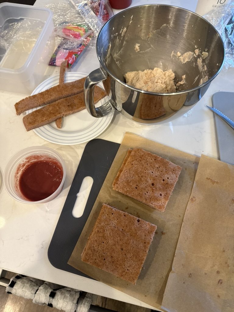 Cut strips beside the cup of strawberry reduction